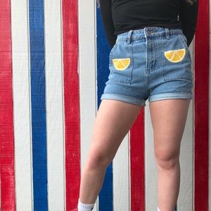 Shorts with a painted acrylic design